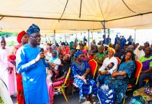 Honourable Minister of Humanitarian Affairs and Poverty Reduction, Dr. Bernard M. Doro, interacting with the beneficiaries of the Household Prosperity and Empowerment Cash Transfer Programme (HOPE-CT) in Kwara State.