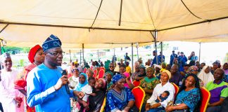Honourable Minister of Humanitarian Affairs and Poverty Reduction, Dr. Bernard M. Doro, interacting with the beneficiaries of the Household Prosperity and Empowerment Cash Transfer Programme (HOPE-CT) in Kwara State.