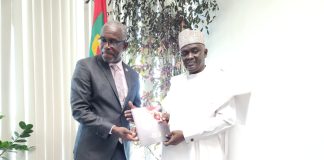 NTAC DG/CEO, RT. HON. YUSUF BUBA YAKUB PRESENTING A COMMEMORATIVE PLAQUE AND NTAC MAGAZINE TO GRENADA'S MINISTER OF FOREIGN AFFAIRS, HON. JOSEPH ANDALL, AFTER BILATERAL DELIBERATIONS.