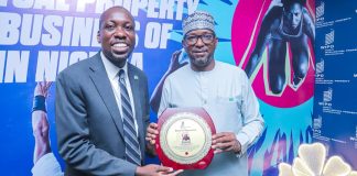 Director World Intellectual Property Organization (WIPO) Nigeria Office Dr. Moody Oluwatobilola presenting an award of appreciation to National Sports Commission Chairman Mallam Shehu Dikko