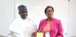 The Director-General/CEO of the Nigerian Technical Aid Corps (NTAC), Rt. Hon. Yusuf Buba Yakub, presenting a plaque and NTAC magazine to the Honourable Minister of Educational Transformation, Barbados, Hon. C. Sandra V. Husbands, M.P.