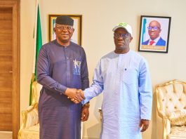 L-R: The Honourable Minister of Water Resources and Sanitation, Engr. Prof. Joseph Terlumun Utsev FNSE in a warm handshake with the Executive Governor of Edo State, Senator Monday Okpebolo, today at Government House Benin.