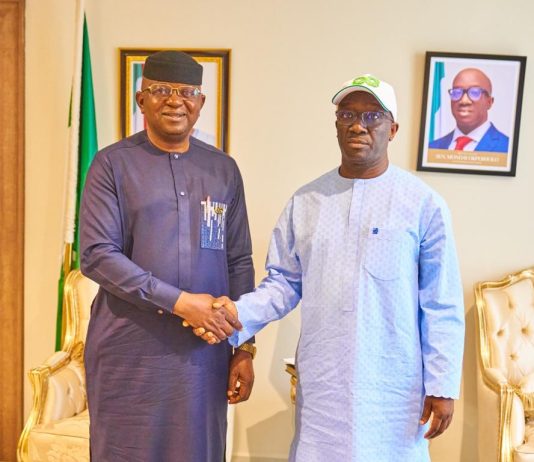L-R: The Honourable Minister of Water Resources and Sanitation, Engr. Prof. Joseph Terlumun Utsev FNSE in a warm handshake with the Executive Governor of Edo State, Senator Monday Okpebolo, today at Government House Benin.