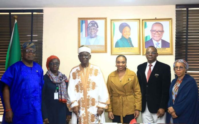 The Hon Min, FMITI Dr. Jumoke Oduwole MFR, (3rd right) the Perm. Sec. FMITI, Dr. Chris Osa Isokpunwu (2nd right) Sir. PPRS, FMITI, Mrs Iya I. Gamawa (1st right), Chairman of the board, Sen. Ibrahim M. Ida CON, (3rd left) , Rep. of CAC Registrar , Mrs Amina Adamu Fika (2nd left) and a member of the Board, Chief Kola Akosile (1st left) in a group photograph shortly after the Inauguration of the Governing Board of the Corporate Affairs Commission, held at the FMITI, Abuja, on Wednesday 22/4/26.