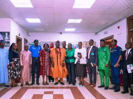 The representative of the Secretary to the Government of the Federation and Permanent Secretary, (GSO), Dr. Ibrahim Abubakar Kana mni, (7th left) in a group photograph with the members of the Inter-Ministerial Committee on the Proliferation and Rationalization of Security and Paramilitary Agencies during the inauguration ceremony on Wednesday 22nd April, 2025 in Abuja.