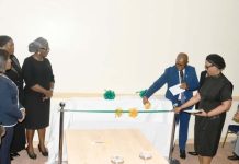 Hon. Justice Obiora Egwuatu of the Federal High Court, assisted by the Director Administration of Criminal Justice and Reform Department, Mrs. Leticia Ayoola-Daniels, Prof. Yemi Akinseye George and other guests during the unveiling of the two documents at Abuja Continental Hotel on 14th April, 2026.