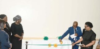 Hon. Justice Obiora Egwuatu of the Federal High Court, assisted by the Director Administration of Criminal Justice and Reform Department, Mrs. Leticia Ayoola-Daniels, Prof. Yemi Akinseye George and other guests during the unveiling of the two documents at Abuja Continental Hotel on 14th April, 2026.