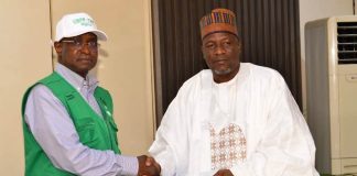 The Honourable Minister of Federal Ministry of Livestock Development Idi Mukhtar Maiha in an handshake with the National President of the National Association of Donkey Farmers in Nigeria, Alhaji Abubakar kagu.