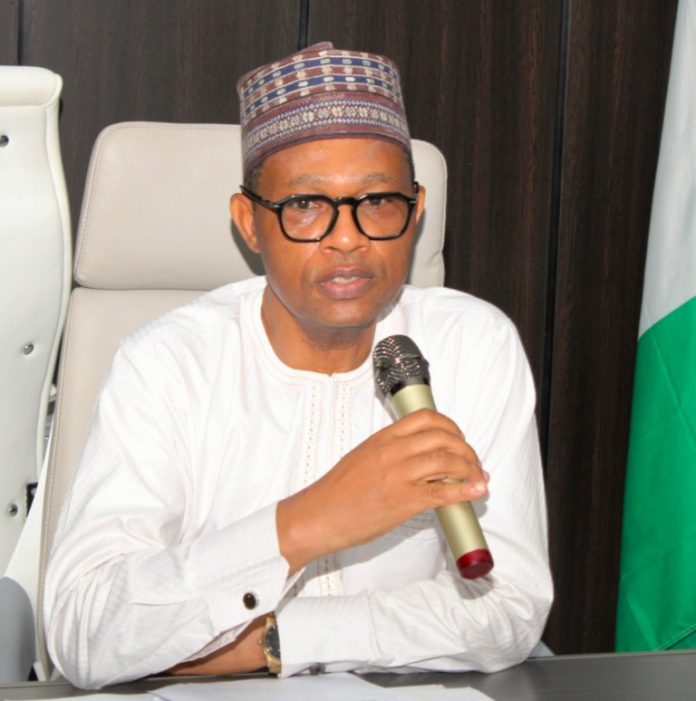 The representative of the Honourable Minister of Humanitarian Affairs and Poverty Reduction. The permanent secretary, Mr Olubunmi Olusanya while inaugurating the Grant implementation team for the World Bank Grant Facility in the office.