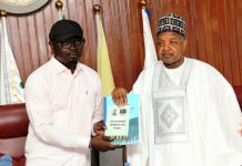 The Honourable Minister, Federal Ministry of Youth Development, Comrade Ayodele Olawande (left), and the Honourable Minister for Budget and Economic Planning, Senator Abubakar Atiku Bagudu (right), during the handover ceremony at the 22nd Meeting of the Nigeria Open Government Partnership (OGP) National Steering Committee held in Abuja on Friday, 17th April, 2026.