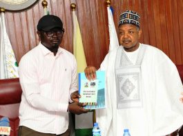 The Honourable Minister, Federal Ministry of Youth Development, Comrade Ayodele Olawande (left), and the Honourable Minister for Budget and Economic Planning, Senator Abubakar Atiku Bagudu (right), during the handover ceremony at the 22nd Meeting of the Nigeria Open Government Partnership (OGP) National Steering Committee held in Abuja on Friday, 17th April, 2026.
