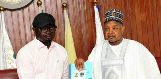 The Honourable Minister, Federal Ministry of Youth Development, Comrade Ayodele Olawande (left), and the Honourable Minister for Budget and Economic Planning, Senator Abubakar Atiku Bagudu (right), during the handover ceremony at the 22nd Meeting of the Nigeria Open Government Partnership (OGP) National Steering Committee held in Abuja on Friday, 17th April, 2026.