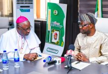 R-L: The honourable minister of Humanitarian Affairs and Poverty Reduction. Dr. Bernard M. Doro listened to Arch Bishop of Abuja, Archbishop Ignatius Ayau Kaigama when he paid him a courtesy visit in his office.