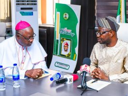 R-L: The honourable minister of Humanitarian Affairs and Poverty Reduction. Dr. Bernard M. Doro listened to Arch Bishop of Abuja, Archbishop Ignatius Ayau Kaigama when he paid him a courtesy visit in his office.