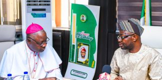 R-L: The honourable minister of Humanitarian Affairs and Poverty Reduction. Dr. Bernard M. Doro listened to Arch Bishop of Abuja, Archbishop Ignatius Ayau Kaigama when he paid him a courtesy visit in his office.