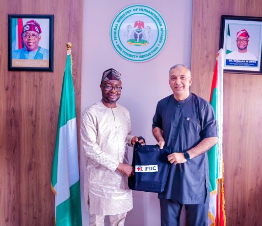 L-R : The honourable minister of Humanitarian Affairs and Poverty Reduction. Dr. Bernard M. Doro received a souvenir from the leader of the delegation Dr. Ghulam Muhammad Awan during the courtesy visit in his office.