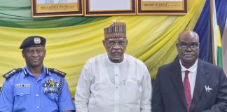Pic-Middle-Minister of Police Affairs, Senator Ibrahim Gaidam,Right-IGP Olatunji Rilwan Disu and Left the Permanent Secretary of the Ministry of Police Affairs Dr. Ogbonnaya Anuma Nlia during the handing over of the newly gazetted Nigeria police Regulations(Amendment) Act at the Headquarters of the Ministry in Abuja.