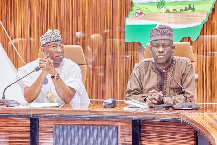 Left: Dr. Abdulmumini Aminu-Zaria, Executive Director, Nigeria Integrated Water Resources Management Commission (NIWRMC). Right: Abdulhamid Umar, National Project Coordinator, ACReSAL. During a courtesy meeting at the ACReSAL National Office, Abuja.