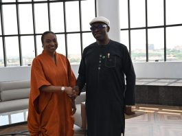 L-R: Hon. Minister of Industry, Trade and Investment, Dr. Jumoke Oduwole in a handshake with Hon. Enefe Ekene, Chairman, Investment Monitoring Committee and Federal Commissioner, Anambra State
