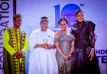 (2nd left) The representative of Mr. President and Secretary to the Government of the Federation, Sen. George Akume CON displaying the plague of the Presidential Award presented to President Tinubu by the Tunji Braithwaite Foundation in Abuja.