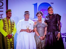 (2nd left) The representative of Mr. President and Secretary to the Government of the Federation, Sen. George Akume CON displaying the plague of the Presidential Award presented to President Tinubu by the Tunji Braithwaite Foundation in Abuja.