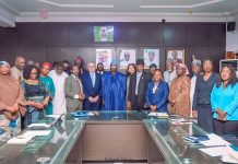 PHOTO-NEWS: Dr. Iziaq Adekunle Salako Honourable Minister of State for Health and Social Welfare (Center) flanked by his right is Dr. Boro Dropulic, leader of the delegation from Caring Cross, 2nd is Dr. Obi Adigwe, DG NIPRD; by his Left is Ms Shariha Khalid, 2nd is Dr John Ovuoraye, Director HPRS, representing the Permanent Secretary of Health, Daju Kachollom S. mni., 3rd is Dr. Adeola Olufowobi Dr. Food and Drugs Services, 4th is Dr. Amina Muhammad, Director, Child Health Division.