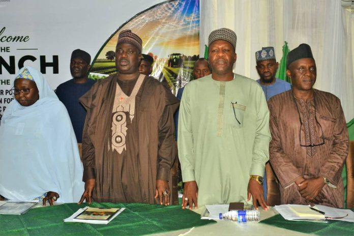 The Minister of State for Agriculture and Food Security, Sen Dr Aliyu Sabi Abdullahi and other stakeholders during the launch of the Revised National Gender Policy on Agrifood Systems Transformation for Nigeria and its Strategic Plan of Action for 2025 - 2030.