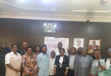 Front row: (L-R): Madam Favour Adams representative of Engender Health, Muriel Mafico, Resident Representative, UNFPA, Dr. Jibrin Kasim, representative of Country Representative WHO, Dr. Imaobong Umah, Director, Nursing Division, Dr. Abisola S. Adegoke, representing Coordinating Minister of Health and Social Welfare Professor Muhammad Ali Pate, Dr. Okpako Okpikpi, representing Permanent Secretary, Daju Kachollom, Dr. Alhasan Ndagi, Registrar/CEO, Nursing and Midwifery Council of Nigeria, and Dame Francisca, Director, Regulatory bodies
