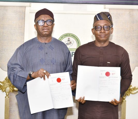 R-L: Director-General, Bureau of Public Procurement (BPP), Dr. Adebowale A. Adedokun, FCIPS and National Commissioner/CEO, National Data Protection Commission (NDPC), Dr. Vincent Olatunji displaying the copies of the signed Memorandum of Understanding (MoU) by BPP and NDPC in Abuja
