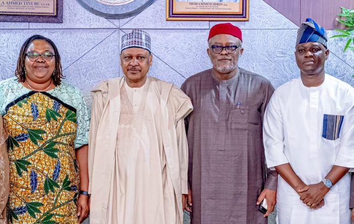 (L–R) The Permanent Secretary, Federal Ministry of Information and National Orientation, Dr. Binyerem Chigbonwu Ukaire; the Honourable Minister of Information and National Orientation, Mohammed Idris, fnipr; Executive Secretary/Chief Executive Officer, Nigerian Press Council, Dr. Dili Ezughah; and Director-General, Nigerian Tourism Development Authority (NTDA), Dr. Olayiwola Nurudeen Awakan, during a meeting with the Book Publication Committee of the Nigerian Press Council on May 12, 2026, in Abuja. Photo: Khalid Ahmed/FMINO
