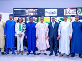 (L–R) Director-General, News Agency of Nigeria (NAN), Ali M. Ali; Director-General, Federal Radio Corporation of Nigeria (FRCN), Dr. Mohammed Bulama; Managing Director/Chief Executive Officer, Nigerian Communications Satellite Limited (NIGCOMSAT), Mrs. Nkechi Jane Egerton-Idehen; Director-General, National Orientation Agency (NOA), Mallam Lanre Issa-Onilu; the Honourable Minister of Information and National Orientation, Mohammed Idris, fnipr; Director-General, National Broadcasting Commission (NBC), Mr. Charles Ebuebu; Director-General, Nigerian Television Authority (NTA), Comr. Salihu Abdulhamid Dembos, fnipr; and Director-General, Voice of Nigeria (VON), Mallam Jibrin Baba Ndace, during the Honourable Minister’s facility tour of NIGCOMSAT on May 13, 2026, in Abuja. Photo: Khalid Ahmed/FMINO