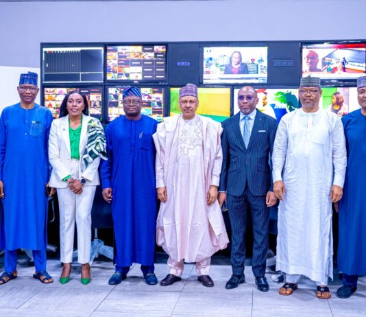 (L–R) Director-General, News Agency of Nigeria (NAN), Ali M. Ali; Director-General, Federal Radio Corporation of Nigeria (FRCN), Dr. Mohammed Bulama; Managing Director/Chief Executive Officer, Nigerian Communications Satellite Limited (NIGCOMSAT), Mrs. Nkechi Jane Egerton-Idehen; Director-General, National Orientation Agency (NOA), Mallam Lanre Issa-Onilu; the Honourable Minister of Information and National Orientation, Mohammed Idris, fnipr; Director-General, National Broadcasting Commission (NBC), Mr. Charles Ebuebu; Director-General, Nigerian Television Authority (NTA), Comr. Salihu Abdulhamid Dembos, fnipr; and Director-General, Voice of Nigeria (VON), Mallam Jibrin Baba Ndace, during the Honourable Minister’s facility tour of NIGCOMSAT on May 13, 2026, in Abuja. Photo: Khalid Ahmed/FMINO