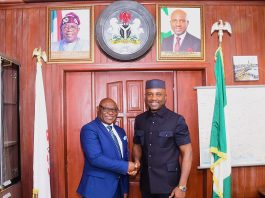 Hon. Minister of Innovation, Science and Technology, FMIST, Dr. Kingsley Tochukwu Udeh, SAN, (right) in a handshake with the President/Vice Chancellor Babcock University Nigeria Prof. Afolarin Olutunde Ojewole (left) during the visit.