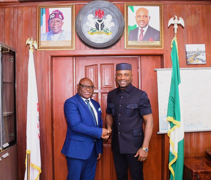 Hon. Minister of Innovation, Science and Technology, FMIST, Dr. Kingsley Tochukwu Udeh, SAN, (right) in a handshake with the President/Vice Chancellor Babcock University Nigeria Prof. Afolarin Olutunde Ojewole (left) during the visit.