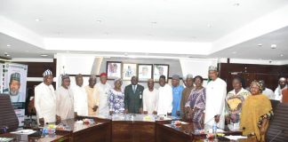 The Representative of the Minister of State for Agriculture and Food Security/ Permanent Secretary in the Ministry, Dr Marcus Olaniyi Ogunbiyi (C) and Members of the Ministerial Technical Committee on RH- CRRP.