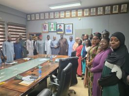 Group Photograph taken during the Inauguration of the Reconstituted Project Management Team (PMT) for the Implementation of Enterprise Content Management (ECM) held at the Permanent Secretary Conference Room, Abuja.