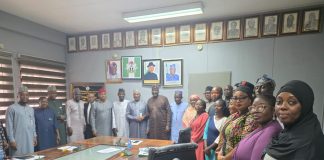 Group Photograph taken during the Inauguration of the Reconstituted Project Management Team (PMT) for the Implementation of Enterprise Content Management (ECM) held at the Permanent Secretary Conference Room, Abuja.