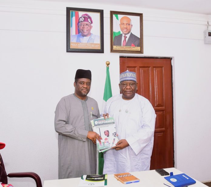 Permanent Secretary, Federal Ministry Innovation, Science and Technology (FMIST) Dr. Mukhtar Yawale Muhammad, mni (left) receiving booklets on reform policies in the Federal Civil Service from Director-General, Bureau of Public Service Reforms (BPSR) Nigeria Mr. Dasuki Ibrahim Arabi (right) during the visit.