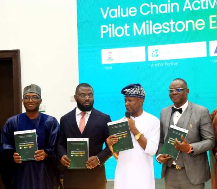 The Hon Min of State (Industry) FMITI, Sen. John Owan Enoh (2nd right) the Perm. Sec. FMITI, Dr. Chris Osa Isokpunwu (1st right) the Regional Director/ Country Rep. United Nations Industrial Development Organization (UNIDO), Amb. Philbert Johnson (1st left) the MD Bank of Agriculture, Mr Ayo Oludare Sotinrin (2nd left) during the Phase I Showcase and Stakeholders Engagement of the National Cotton, Textile and Garment Industrial Transformation Programme (NCTG- ITP) held in Abuja on Thursday 14/5/26.