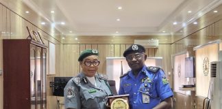 L-R:NCS Area Controller Edo/Delta Judith Kanu And The CP Yemi Oyeniyi psc, acipm, mnips During The Visit To CP's Office Police Headquarters, Asaba Delta State.