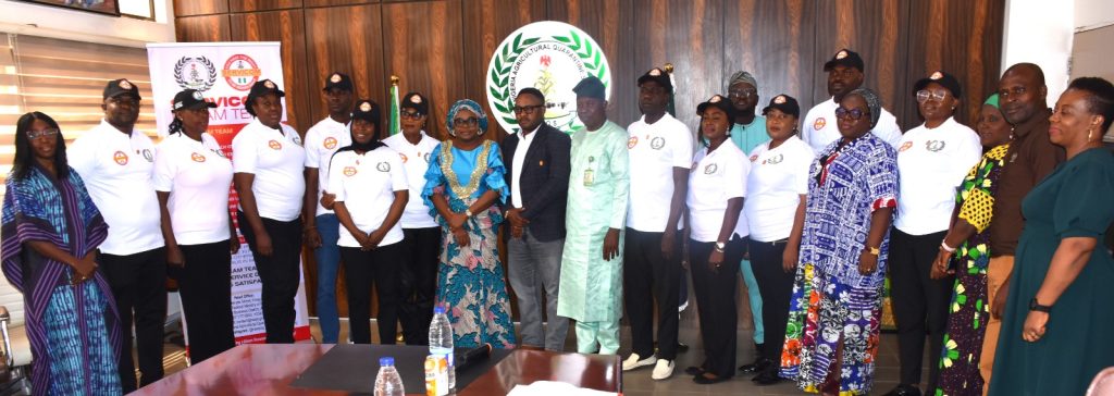 The Ag. National Coordinator/CEO of the SERVICOM Office, Mrs. Helen Lawal and other dignitaries in a group photograph with SERVICOM Unit/committee members during the Inauguration at the Nigeria Agricultural Quarantine Service (NAQS) Headquarters in Abuja.