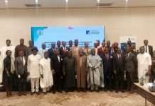 (7th right) The representative of the Secretary to the Government of the Federation and Permanent Secretary (GSO) Dr. Ibrahim Abubakar Kana mni in a group photograph with participants of the Induction Programme for Chief Executive Officers, Chairmen and members of Governing Boards of Parastatals, Agencies and Commissions inaugurated by the Federal Government taking place in Abuja.