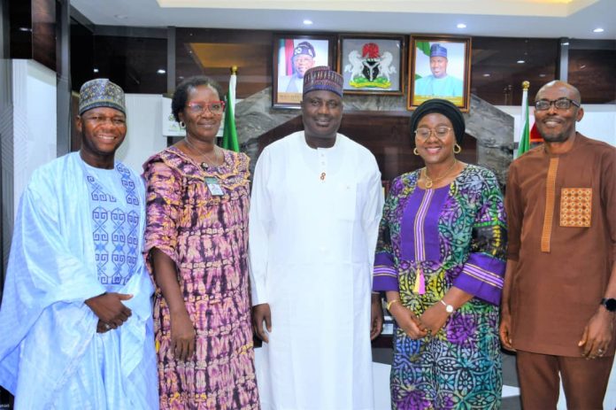 The Minister of State for Agriculture and Food Security, Sen Dr Aliyu Sabi Abdullahi (C) , left hand side of the Minister, Deputy Executive Director, WAVE, Prof Angela Eni, during the couresty visit.
