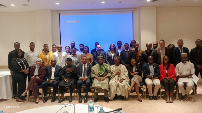 IMG-20260519-WA0197 ( 5th left - sitting) The Permanent Secretary (GSO) DR. Ibrahim Abubakar Kana mni flanked by Managing Director/ Chief Executive Officer of Galaxy Backbone Prof. Ibrahim Adeyanju (5th right - sitting) in a group photograph with the participants from other African countries during high-level continent engagement that took place in Abuja.