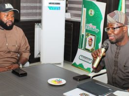 Right: The Honourable Minister of Humanitarian Affairs and Poverty Reduction. Dr. Bernard M. Doro addressing the leadership team of the National Association of Nigerian Students (NANS) besides him is the President, of the NANS, Comrade Olushola Oladoja, when the executive of NANS paid him a courtesy visit in his office.