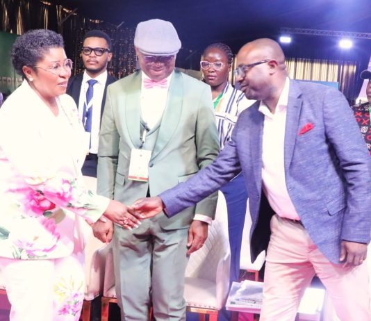 The Honourable Minister of Interior, Olubunmi Tunji-Ojo exchanging handshakes with the Head of the Civil Service of the Federation, Mrs Didi Esther Walson-Jack