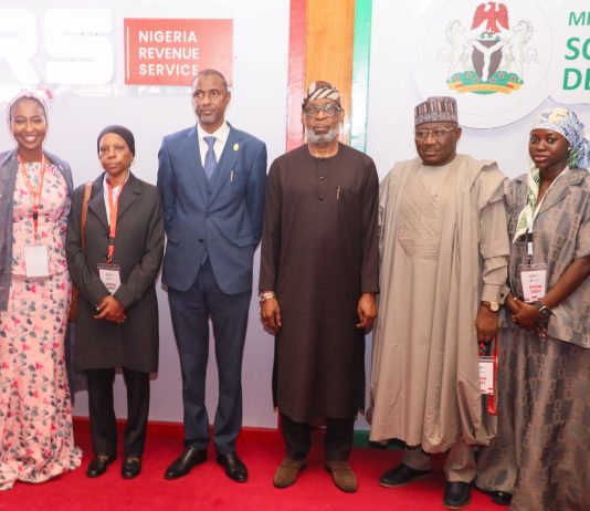 L-R: Special Assistant to Minister of Sold Minerals Development Amira Waziri, Executive Director, Large Tax Group, Amina Ado, Permanent Secretary, Ministry of Sold Minerals Development, Permanent Secretary, Ministry of Solid Minerals Development, Faruk Yusuf Yabo , Minister of Solid Minerals Development, Dr. Dele Alake; Executive Director, Finance and Corporate Services Nigeria Revenue Service, Alhaji Lawal Abubakar and Group Director, Non-Tax Revenue, Hauwa Ibrahim during the NRS–MSMD Joint Stakeholder Sensitization (North Central) titled “From Resource to Revenue: Aligning Solid Minerals Operations with the 2025 Tax Reform Act,” organised by the Nigeria Revenue Service and the Federal Ministry of Solid Minerals Development in Abuja on May 20, 2026.