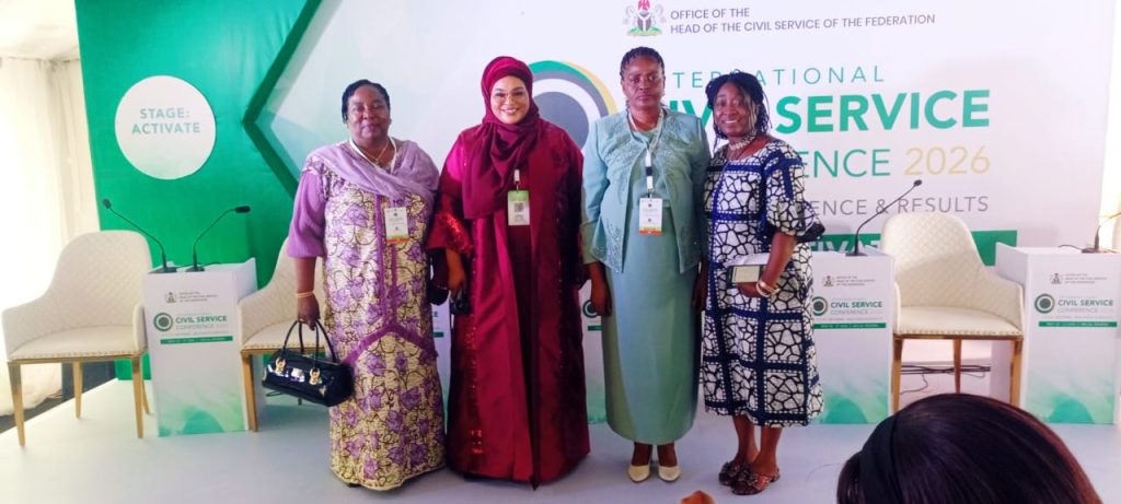 The permanent secretary, federal ministry of Women Affairs and Social Development. Mrs. Esuabana Nko Asanye in a group photogragh (2nd right), after questions and answers at the end of the discussion on the first day of the international Civil Service Conference taking place at the eagle square in Abuja.