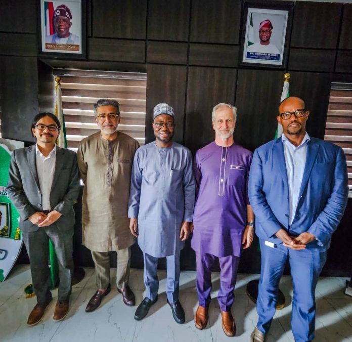 Middle: The honourable minister of Humanitarian Affairs and Poverty Reduction. Dr Bernard M. Doro, to his left is the leader of the delegation Mr Roberts Chase and other members of the delegation from the World Bank when they visited the minister.