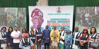PHOTO -NEWS: The Permanent Secretary Federal Ministry of Health and Social Welfare, Daju Kachollom S. mni (C) flanked right and left by NEMSAS Desk officers at the Presidential Commissioning of Tricycle Ambulances.